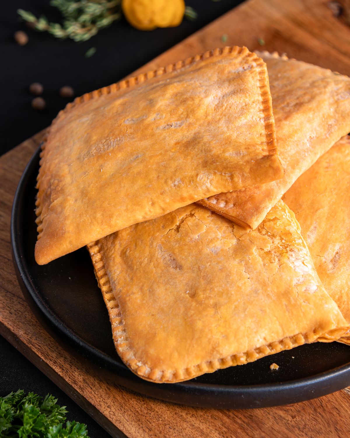 Stack of golden Jamaican patties